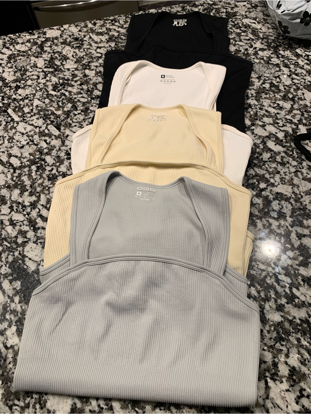 OQQ Ribbed Scoop Bodysuit 4 Pack — Black, White, Cream, Gray
